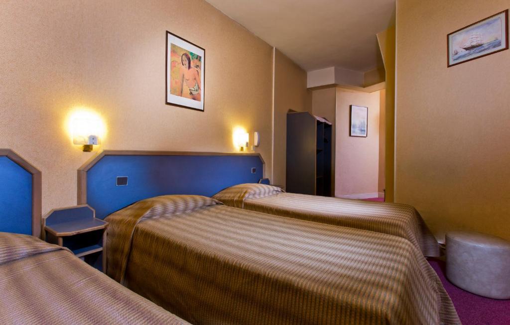 Hotel La Parizienne Szoba fotó