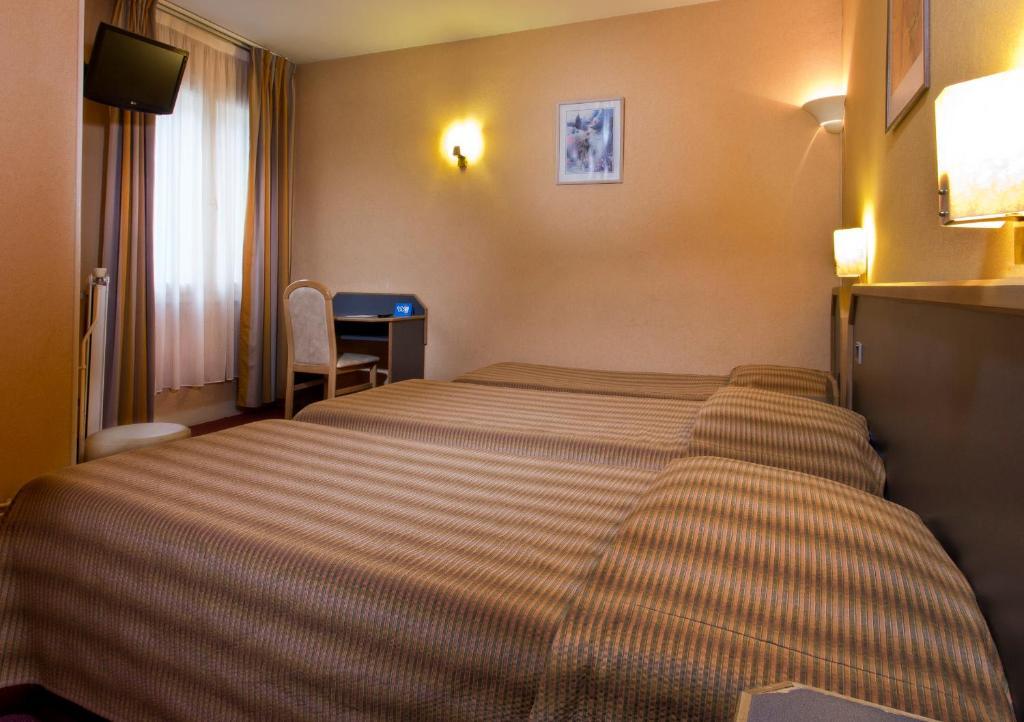 Hotel La Parizienne Szoba fotó